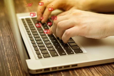 Man is using laptop with black keys, Social media and social networking.  Stock Photos