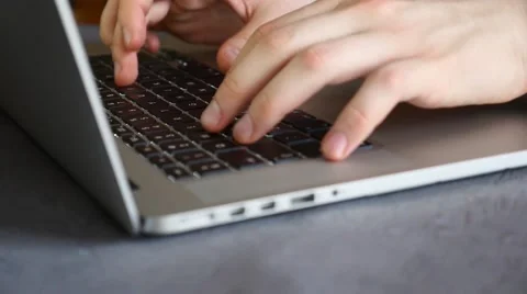 Man is using laptop. Close up. Slow motion. 스톡 동영상 61281779