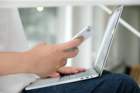 Man using laptop computer and smart phone, people and technology, lifestyles Stock Photos