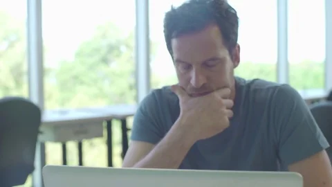 Man using laptop computer Stock Footage 75194348