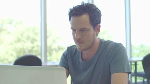 Man using laptop computer Stock Footage 75194451