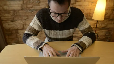 Man using laptop computer getting upset Stock Footage 68636125