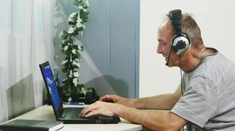 Man using laptop computer at home. Stock Footage 67670477