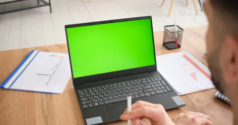 Man using a laptop computer. Mockup Stockbeeldmateriaal 150023604