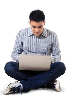 Man using laptop computer seriously Stock Photos