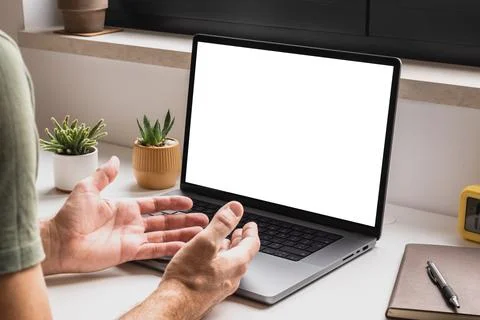 Man using laptop computer for video conference call at home, mockup screen .. Foto stock