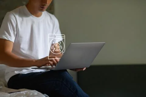 Man Using Laptop for Digital Scanning and Technology Concept Stock Photos