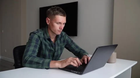 Man using laptop, for distance work at home. Stock Footage 317750506