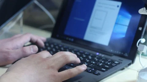 Man is using a laptop Stock Footage 87135366