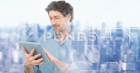 Man using laptop with geometric city transition Stock Photos