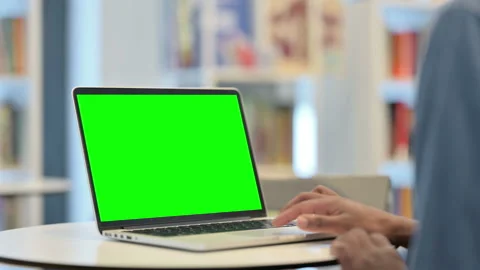 Man Using Laptop with Green Chroma Key Screen, Close Up Stock Footage 146483845