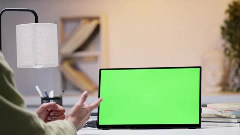 Man Using Laptop with Green Screen in Panoramic Window Office Video stock 294872975