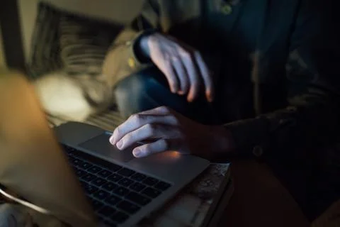 Man using laptop at home Stock Photos