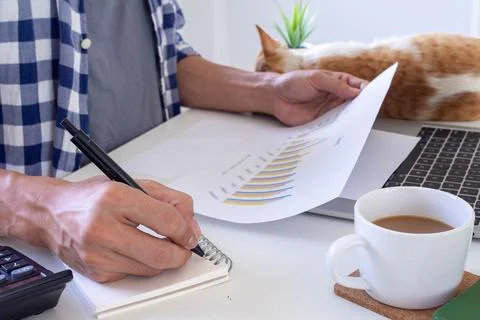 Man using a laptop at home to work or study online to prevent the spread of t Foto stock