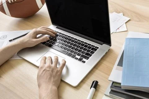 Man using laptop in office Stock Photos