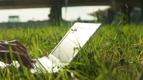Man Using Laptop Outdoors Stockbeeldmateriaal 51813766