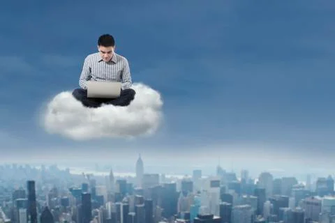 Man using laptop over cloud Stock Illustration