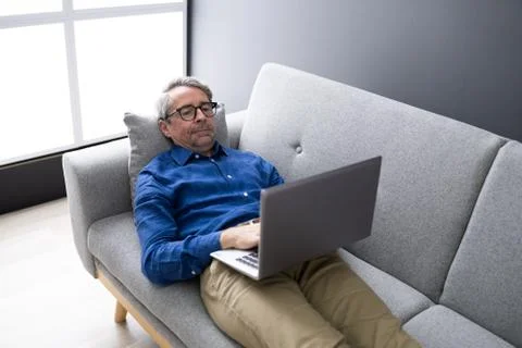 Man Using Laptop Stock Photos
