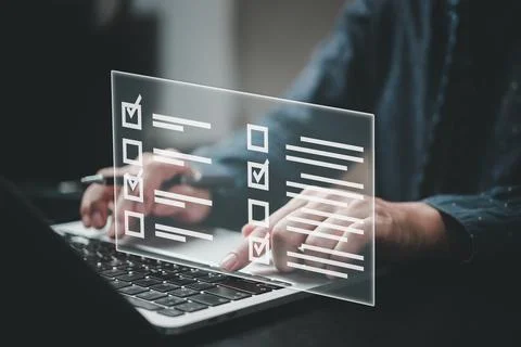 Man using laptop questionnaire with checkbox, survey form online, answer qu.. Stock Photos