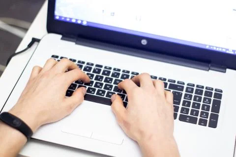 Man using laptop, searching web, browsing information, Stock Photos