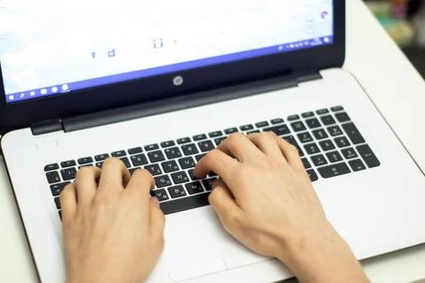 Man using laptop, searching web, browsing information, Stock Photos