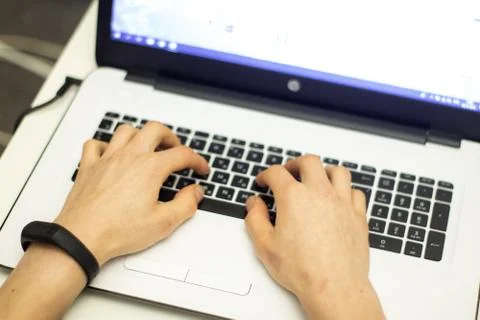 Man using laptop, searching web, browsing information, Stock Photos