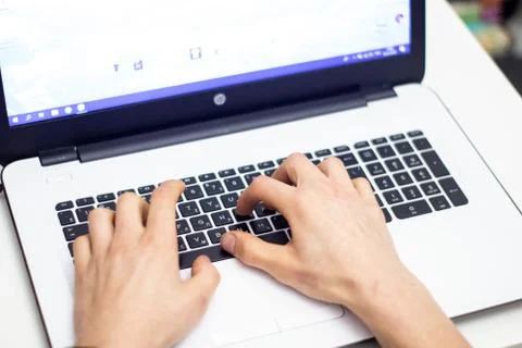 Man using laptop, searching web, browsing information, Stock Photos