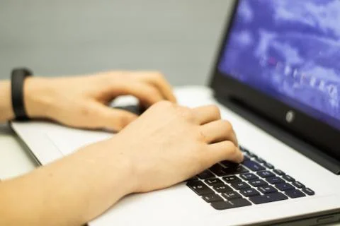 Man using laptop, searching web, browsing information, 스톡 사진