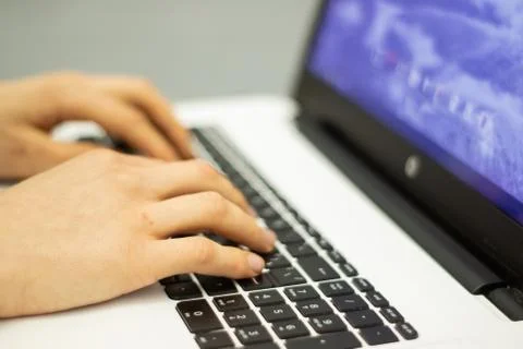 Man using laptop, searching web, browsing information, Stock Photos