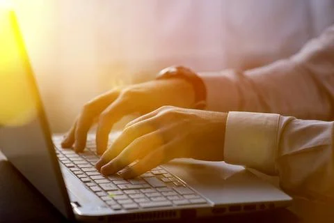 Man using laptop, searching web, browsing information, having workplace Stock Photos