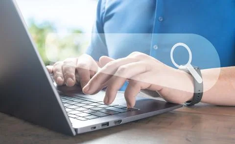 Man using laptop, searching web, browsing information. Data Search Technolo.. Stock Photos