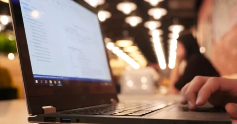 Man Using Laptop  with touch screen for edit document in cafe Stock-Footage 57100899