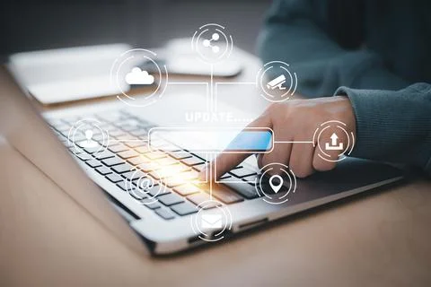 Man using laptop with Update Software Computer Program Upgrade Business Techn Foto stock