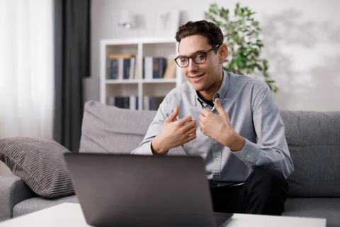 Man using laptop for videochat Stock Photos