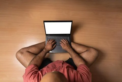 MAN USING LAPTOP VIEW FROM TOP Stock Photos