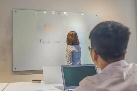 The man using laptop while attending meeting in conference room Stock Photos