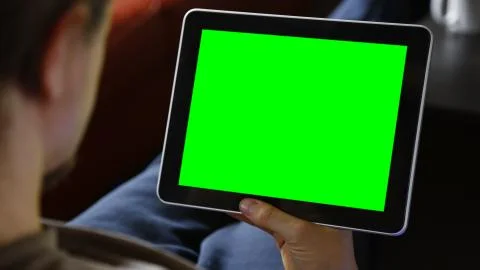 Man Using Large Tablet Green Screen Stock Photos