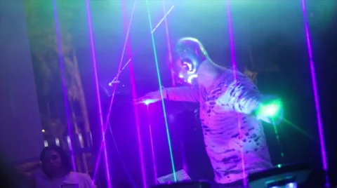 Man using lasers as musical instrument in concert Stock Footage 43148371