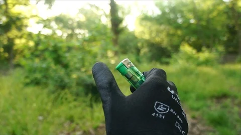Man using Lighter in Nature Forest Stock Footage 111855873
