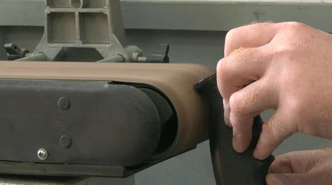 Man using a linisher / belt grinder Stock Footage 46632031