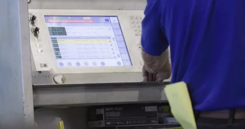 Man Using Machine Controls Stock Footage 200790179
