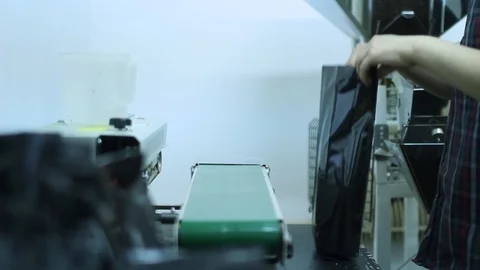 Man using machine specially designed to dispense and package coffee Video stock 100143855