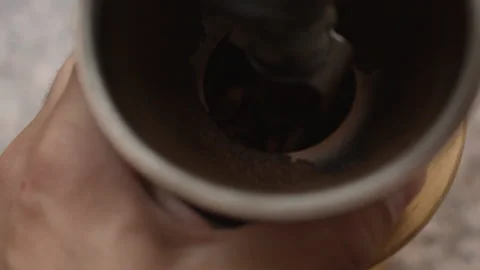 Man using manual coffee grinder Stock Footage 220249835