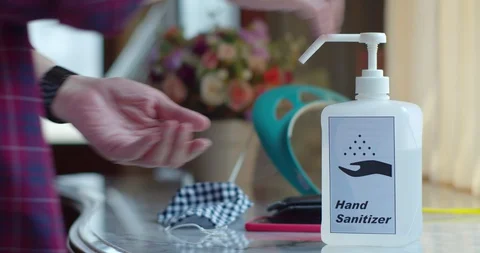 Man using many Infection prevention equipment on table Stock Footage 128410459