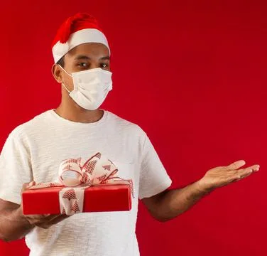 Man using a mask with a gift 스톡 사진