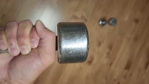 Man using metal dumbells and doing curls Video stock 237980857
