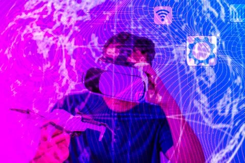 A man using Metaverse digital cyber world technology with wearing and holdi.. Stock Photos