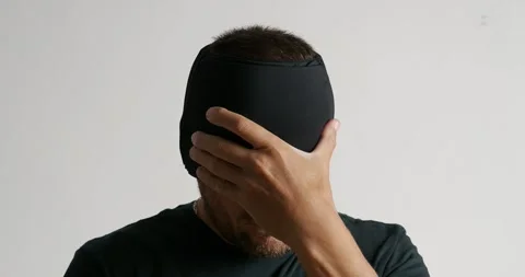 Man using Migraine Relief Cap, Cooling Gel Hat during headache migraine. Stock Footage 275005109