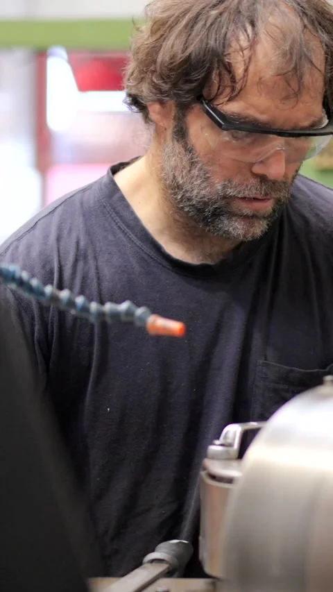 Man using a milling machine in a cnc factory Stock Footage 260271546