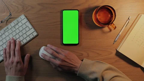 Man using mobile with chroma key screen and keyboard Stock Footage 162619683